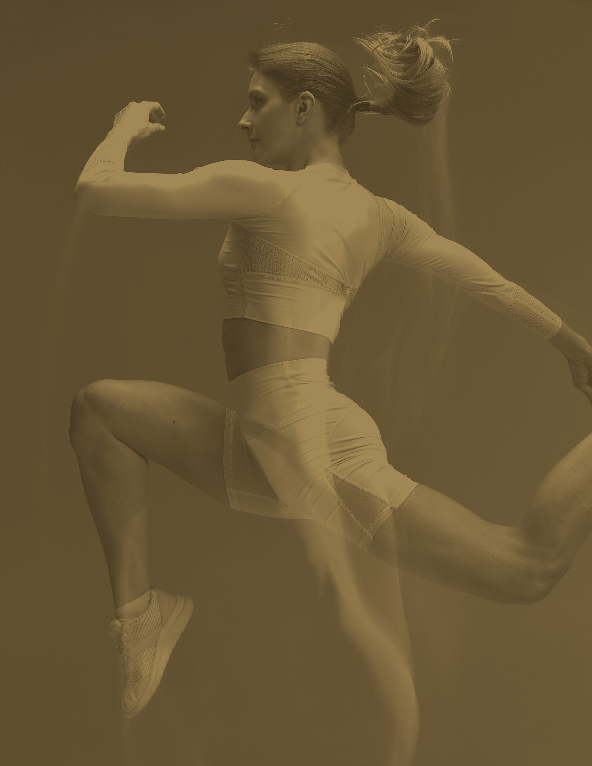 Sporty Girl Running In White Tracksuit On Blue Background. Isolated Fitness Model In Studio With Motion Blur Effect.